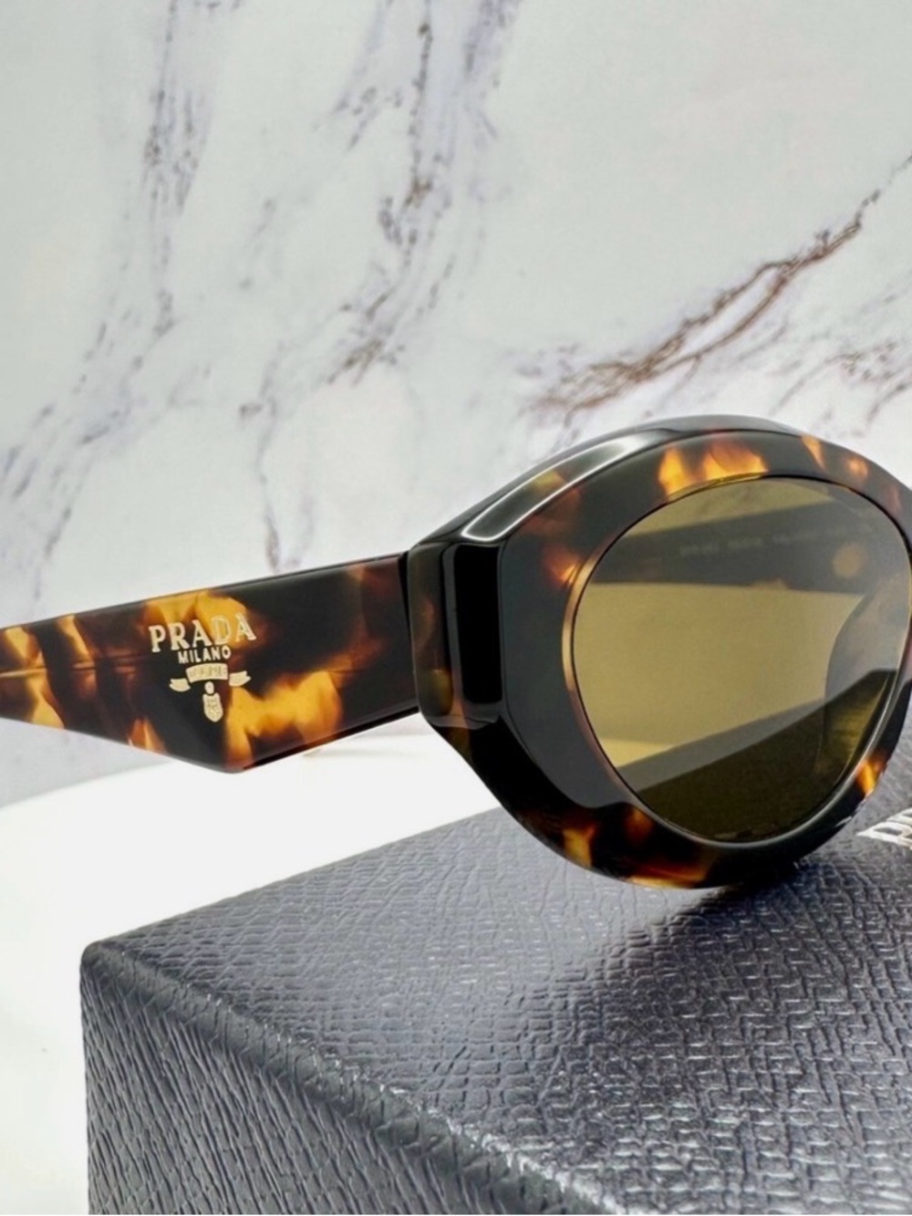 Prada Tortoiseshell Round Sunglasses with Brown Lenses
